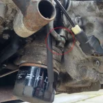 Cam Chain Adj Oil Feed Low Res.webp