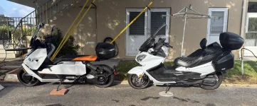 2022 BMW CE 04 and 2013 Suzuki Burgman 650 copy.webp